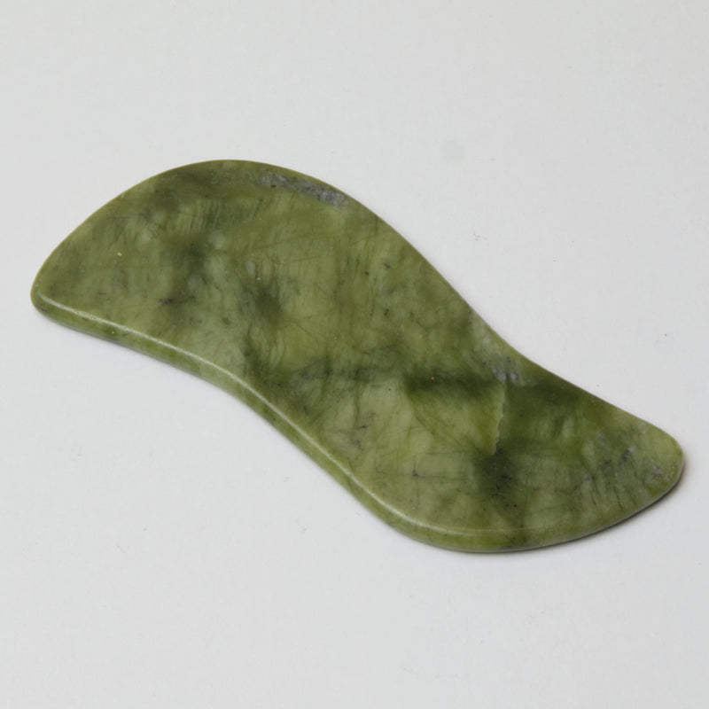 grøn gua sha jade redskab med spil