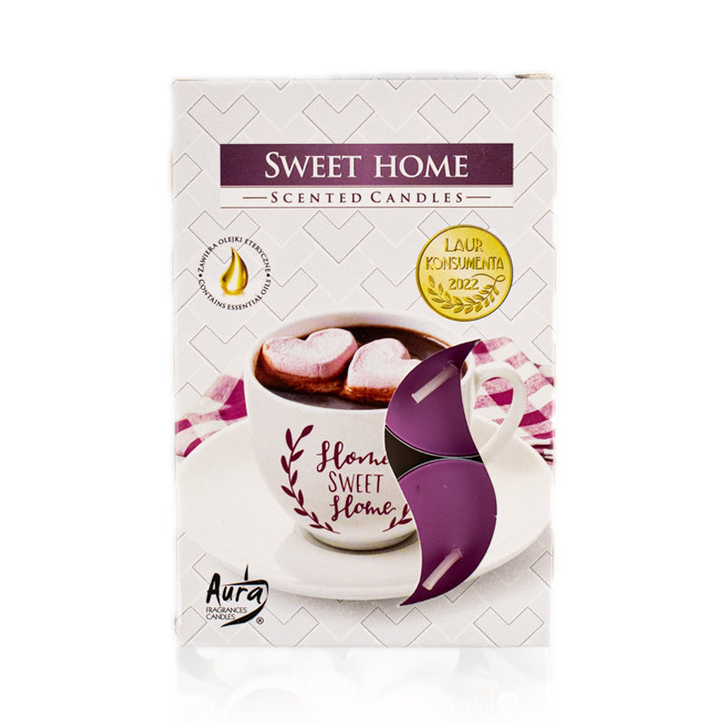 Sweet Home duft fyrfadslys I pap emballage med en kop varm kakao med skumfiser i som påtryk
