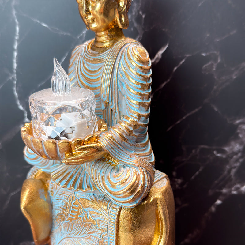 buddha på elefant fyrfadsholder statue set fra siden