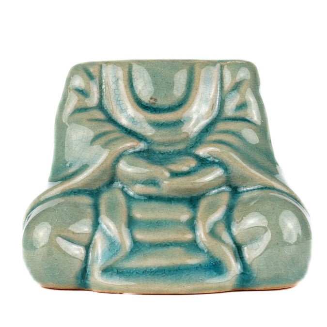 grøn siddende buddha aromaterapi underkrop
