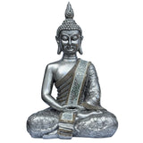 buddha statue i sølv nuancer