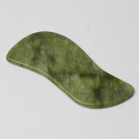 grøn gua sha jade redskab med spil