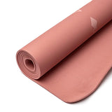 yogamåtte rullet sammen