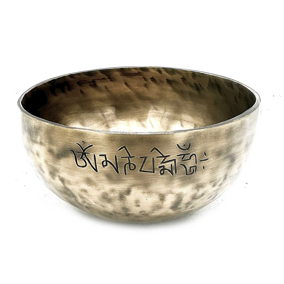 klangskål i gyldne nuancer