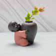 baby munk vase