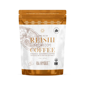 reishi svampekaffe hele bønner i plast pose med orange nuancer