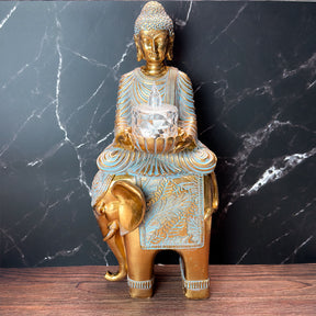 buddha på elefant fyrfadsholder statue i guld nuancer
