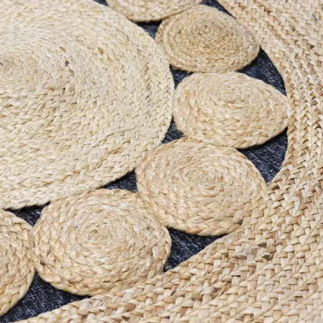 Tæppe i naturfibre fra Indien, rundt i Ø 90 cm med cirkler fra midten