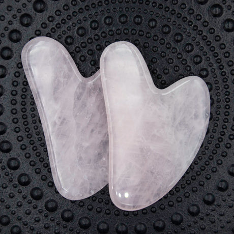 rosakvarts gua sha massage sten 5